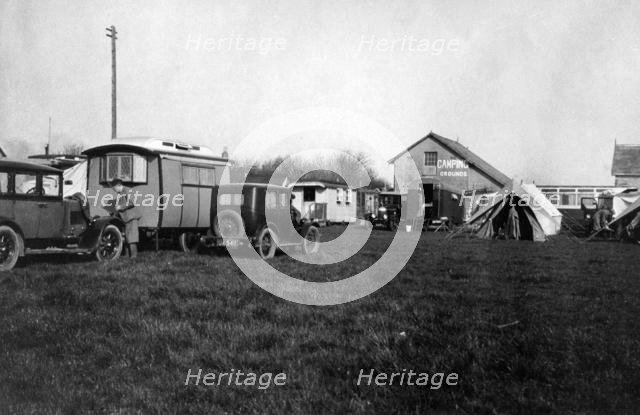Voyageur caravan with Austin Seven on campsite  early 1930's. Creator: Unknown.