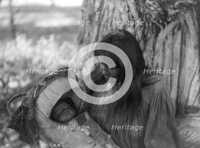 Mizheh and babe, c1906. Creator: Edward Sheriff Curtis.