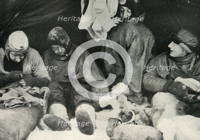 'Members of the Polar Party Getting Into Their Sleeping-Bags', c1911, (1913).  Artist: Herbert Ponting.