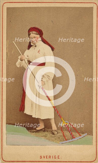 Sverige. woman raking hay, about 1867. Creator: W.A. Eurenius & P.L. Quist.