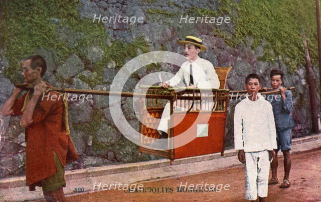 Man being carried on a Sedan chair, Hong kong, 20th century. Artist: Unknown