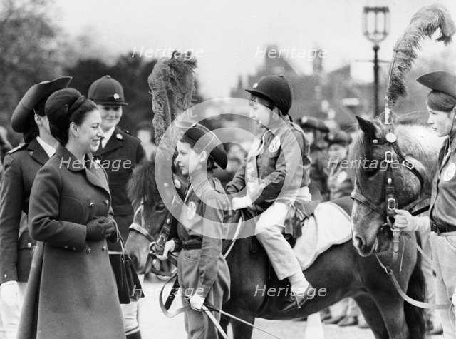 Princess Margaret talking with disabled children at Hampton Court Palace, 1969. Artist: Unknown
