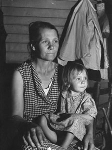 Mother and child, FSA camp, Farmersville, Tulare County, California, 1939. Creator: Dorothea Lange.