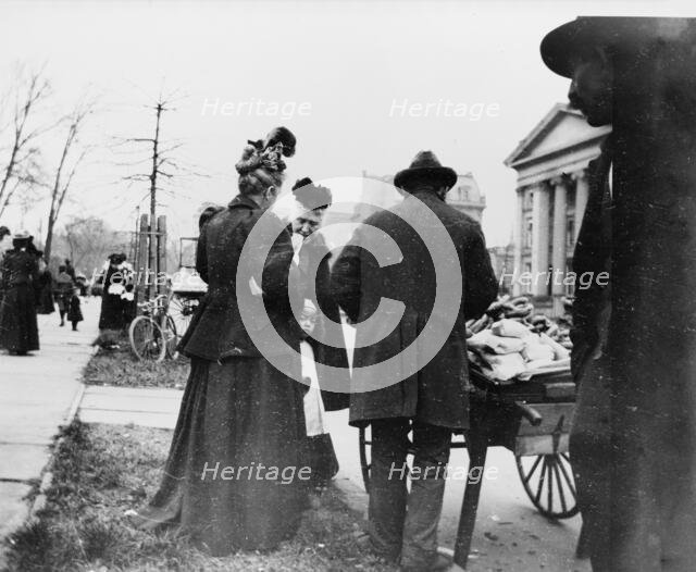 Vendor and cart near the White House during the egg rolling, 1898. Creator: Frances Benjamin Johnston.