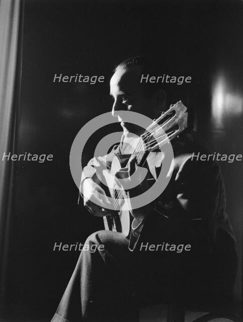 Portrait of Vincente Gomez, Café Society Uptown(?), New York, N.Y., ca. June 1946. Creator: William Paul Gottlieb.