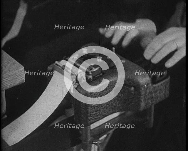 American Civilians Operating Stenotypes During the Lindbergh's Kidnapping Case Trial, 1930s. Creator: British Pathe Ltd.