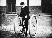 Johnny Dunlop riding his tricycle with rubber tyres, 1888. Artist: Unknown
