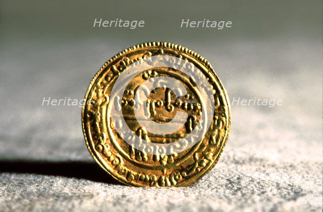 Andalusian gold dinar, also called 'Mancuso', used in Catalan counties during feudal times.