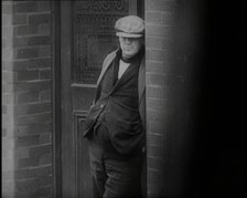 Male Civilians Standing in the Streets, 1926. Creator: British Pathe Ltd.