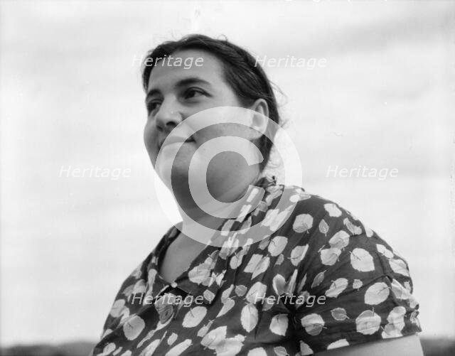 Jewish-American farm mother, Mrs. Cohen, wife of the farm manager, Hightstown, New Jersey, 1936. Creator: Dorothea Lange.