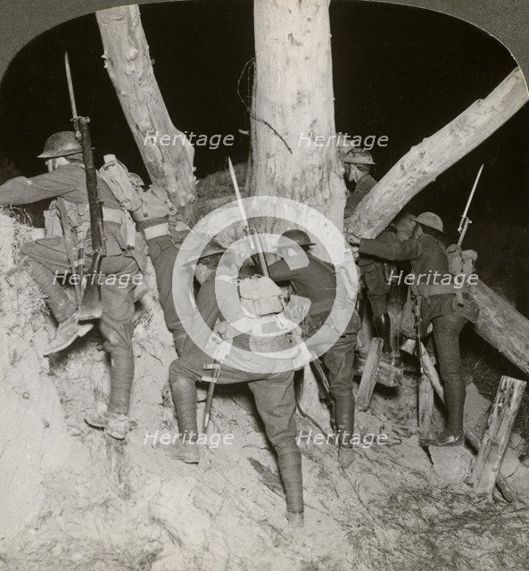 Soldiers leaving a trench for a night raid at Messines, Belgium, World War I, 1914-1918.Artist: Realistic Travels Publishers