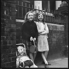 Two girls collecting 'pennies for the guy', Westport Road, Burslem, Stoke-on-Trent, 1965-1968. Creator: Eileen Deste.