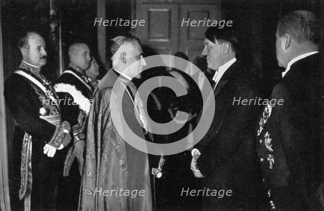 Adolf Hitler at a New Year's reception, 1935. Artist: Unknown