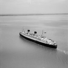 RMS 'Queen Elizabeth' in the Solent approaching Southampton Water, Hampshire, 1949. Artist: Aerofilms.