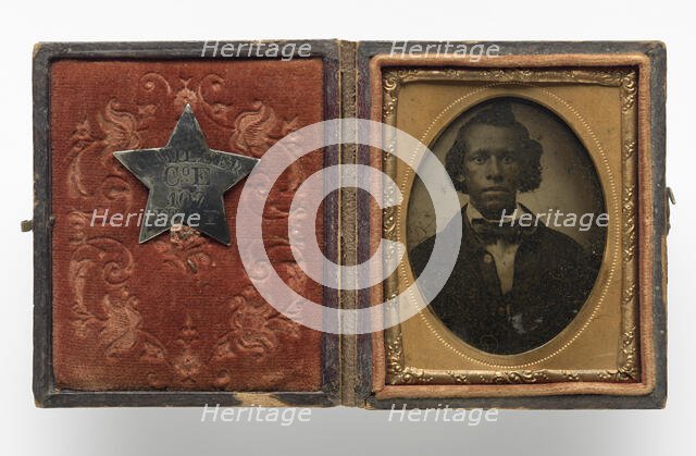 Tintype of Creed Miller with star-shaped military identification pin, 1864. Creator: Unknown.