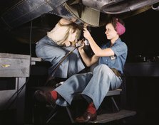 Women at work on bomber, Douglas Aircraft Company, Long Beach, Calif., 1942. Creator: Alfred T Palmer.