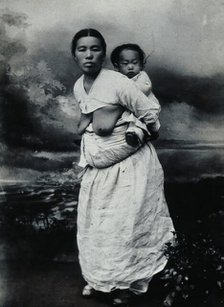 A Korean (?) woman, carrying a baby on her back, approx 1900. Creator: Unknown.