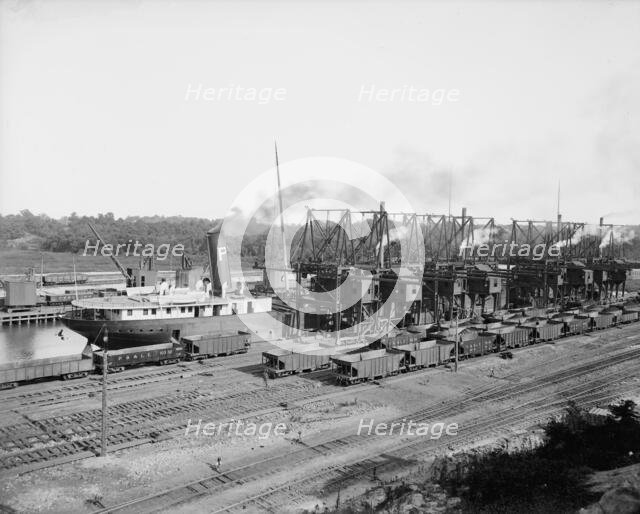 Unloading ore at Conneaut, Ohio, Brown conveying hoists, ca 1900. Creator: Unknown.