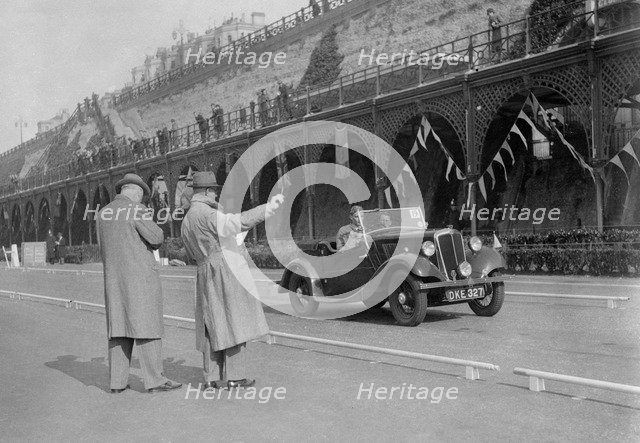 Morris open 2-seater of MC Browning on Madeira Drive, Brighton, RAC Rally, 1939. Artist: Bill Brunell.