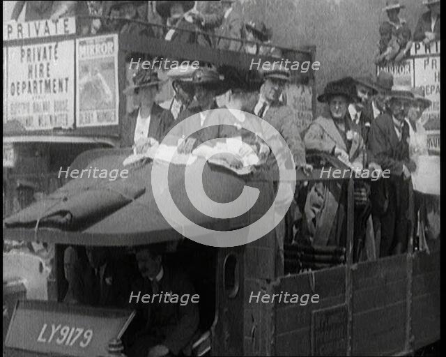 Cars, Buses and Pedestrians Arriving for the 1920 Epsom Derby, 1920. Creator: British Pathe Ltd.