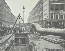 Replacing an old gas main, Commercial Street, London, 1906. Artist: Unknown.