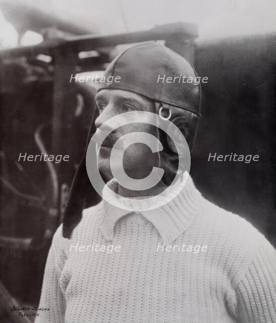 Flight baron Carl Cederström wearing a leather hood. Creators: Allhem publishing house, Sophus Juncker-Jensen.