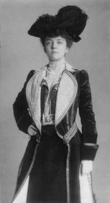 Mrs. Alice Roosevelt Longworth, three-quarter length portrait, standing with..., c1902. Creator: Frances Benjamin Johnston.