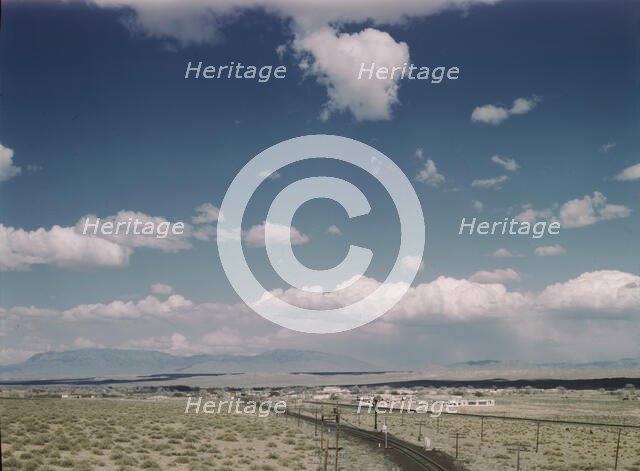 Santa Fe R.R. line going to Albuquerque, New Mexico, past the Isleta Indian reservation, 1943. Creator: Jack Delano.
