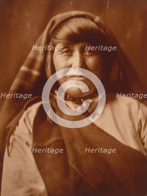 An Acoma woman, head-and-shoulders portrait, facing front, c1904. Creator: Edward Sheriff Curtis.
