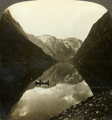 'Looking down the deep, still Naerofjord, from near Gudvangen, Norway', c1905. Creator: Unknown.