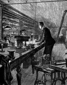 Thomas Alva Edison (Milan, Ohio, 1847-West Orange, New Jersey, 1931) in his lab, inventor of the …