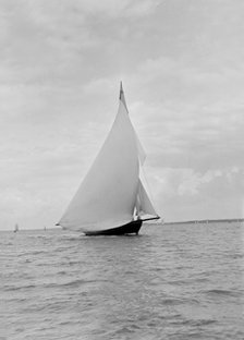 The yawl 'Harbinger' running downwind, 1922. Creator: Kirk & Sons of Cowes.