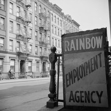 One of the numerous employment agency signs in the Harlem area, New York, 1943. Creator: Gordon Parks.