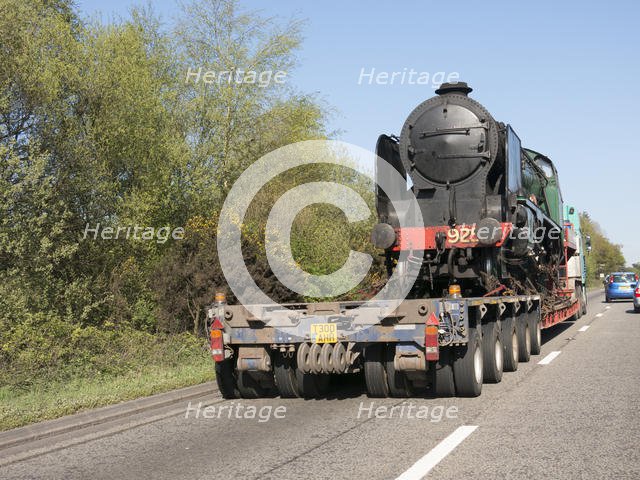 Locomotive being transported by heavy goods vehicle on A31 2015. Creator: Unknown.