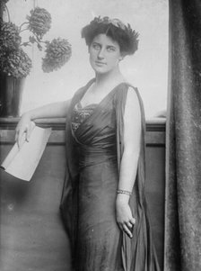 Mrs. Inez Milholland posing with scroll of paper, 1910. Creator: Bain News Service.