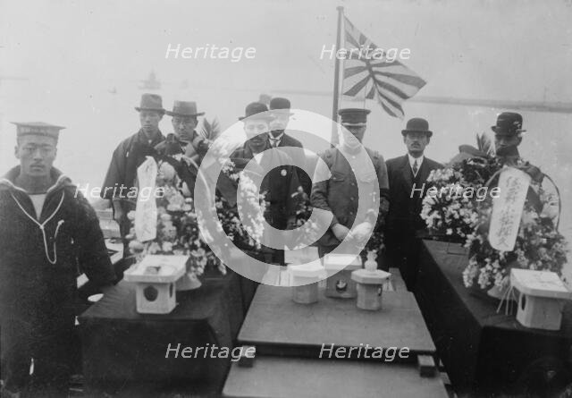 Bodies of Japanese Navy aviators killed by a fall, on torpedo boat, between c1915 and c1920. Creator: Bain News Service.
