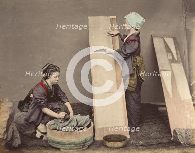[Two Japanese Women Posing with Laundry], 1870s. Creator: Unknown.