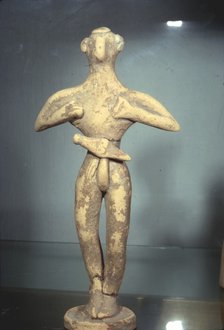 Clay Votive Figurine of Man wearing Belt and Dagger, Proto-Palatial Period, 2000BC-1700 BC.  Artist: Unknown.