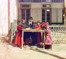 Group of Jewish children with a teacher, Samarkand, between 1905 and 1915. Creator: Sergey Mikhaylovich Prokudin-Gorsky.
