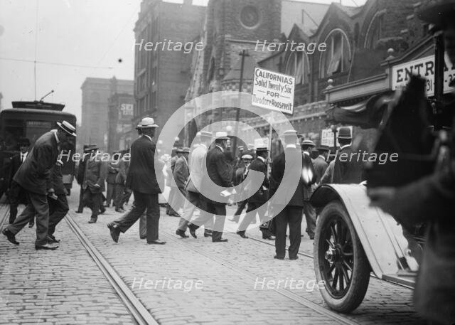 Cal[ifornia] Delegation entering Coliseum, 1912. Creator: Bain News Service.