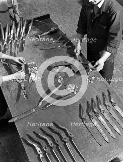 Assembling garden shears, Sheffield, South Yorkshire, 1965. Artist: Michael Walters
