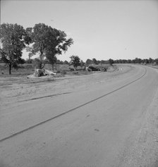 Family camped on U.S. Highway 63, Cache County, Oklahoma, 1937. Creator: Dorothea Lange.