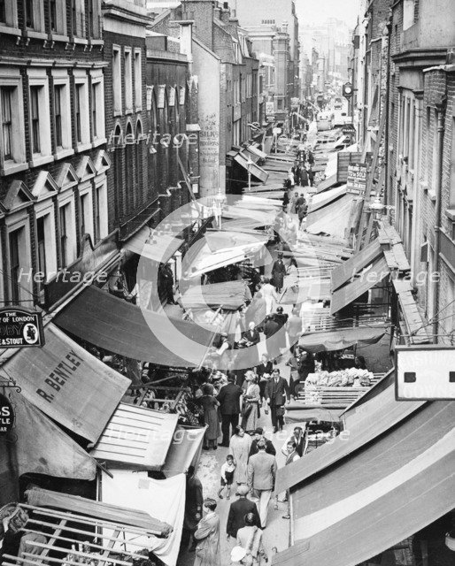 A market along Berwick Street, Soho, London, 1950s. Artist: Unknown