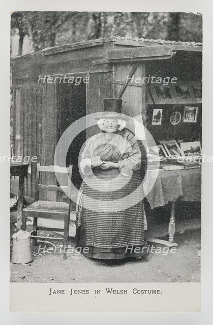 Jane Jones in Welsh Costume at her bookstall in Betws-y-coed, c1910. Creator: Unknown.