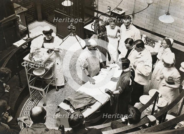 Charing Cross Hospital: Stanley Boyd in the old operating theatre, 1900. Creator: Unknown.