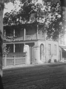 View from across street of a multi-story house, [25 Franklin Street], Charleston..., c1920-1926. Creator: Arnold Genthe.