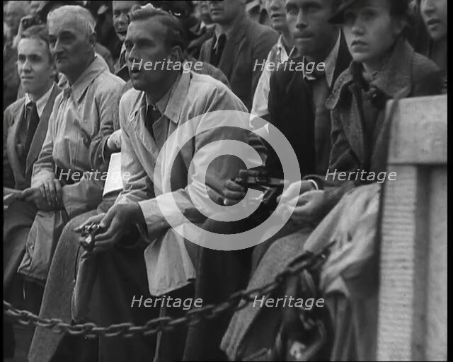 Crowd Watching the 1936 Berlin Olympics, 1936. Creator: British Pathe Ltd.