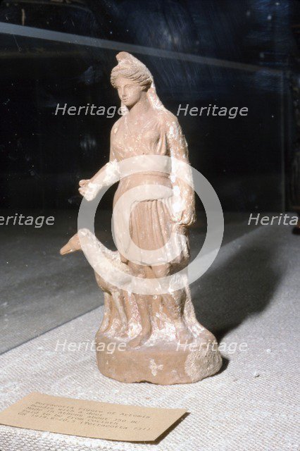 Greek Terracotta, Artemis Bendis with a small hunting dog, c350BC-c300 BC Artist: Unknown.