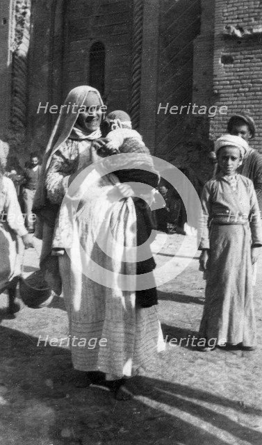 Muslim woman and child, Iraq, 1917-1919. Artist: Unknown