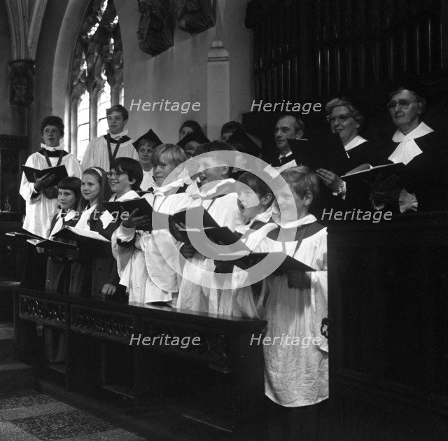 The choir from Brampton Parish Church singing during a service, Rotherham, 1969. Artist: Michael Walters